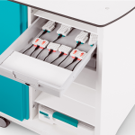 8 LEGO Science motors, sensors and controllers in a USB-C charging tray, stored in a LEGO charging trolley