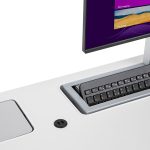 Double pop up monitor desk showing double 60W USB-C ports detail with 1 monitor in the up position for use